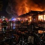 Emergency responders at the scene of the Bangkok pub fire in Thailand on July 13, 2026