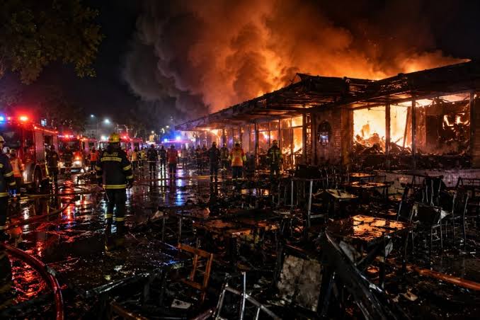 Emergency responders at the scene of the Bangkok pub fire in Thailand on July 13, 2026